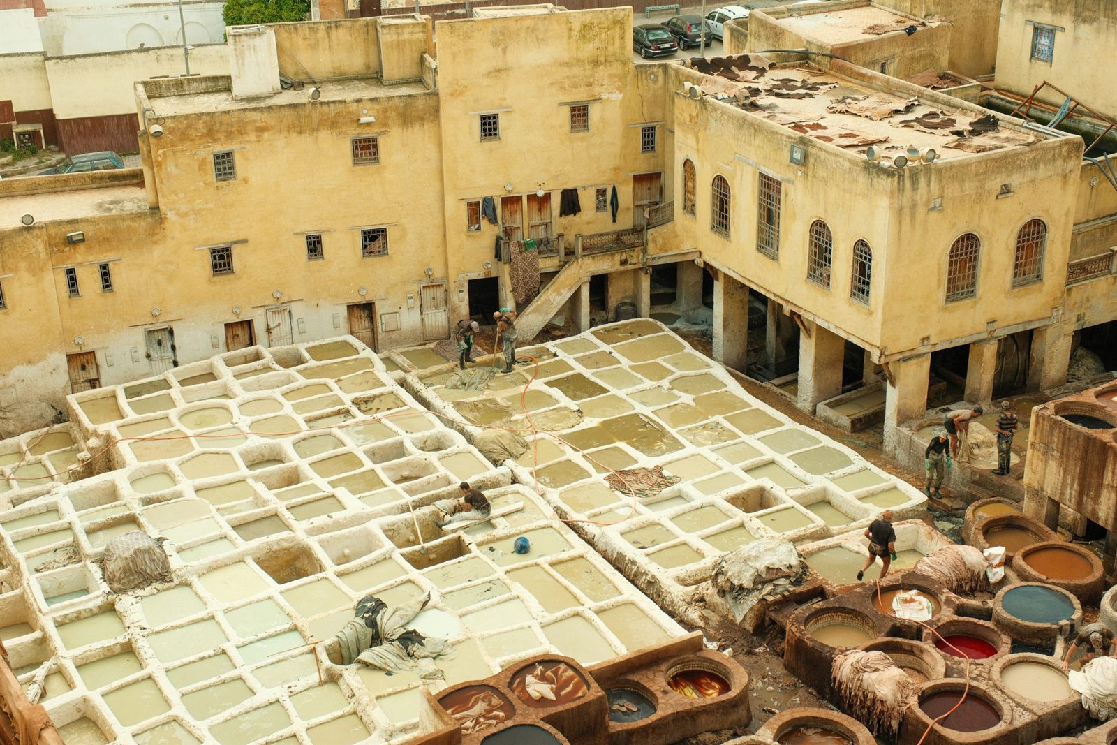 Stone dye vats of a traditional leather tannery in Fez, Morocco